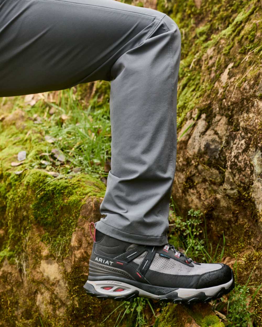 Black Grey coloured Ariat Mens Traverse Mid Waterproof Hiking Boots on outdoor background 