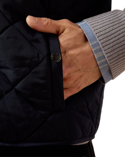 Show Navy coloured Ariat Mens Woodgate Vest on white background 
