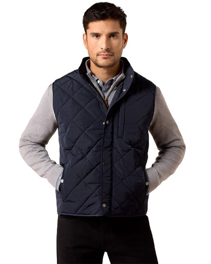 Show Navy coloured Ariat Mens Woodgate Vest on white background 