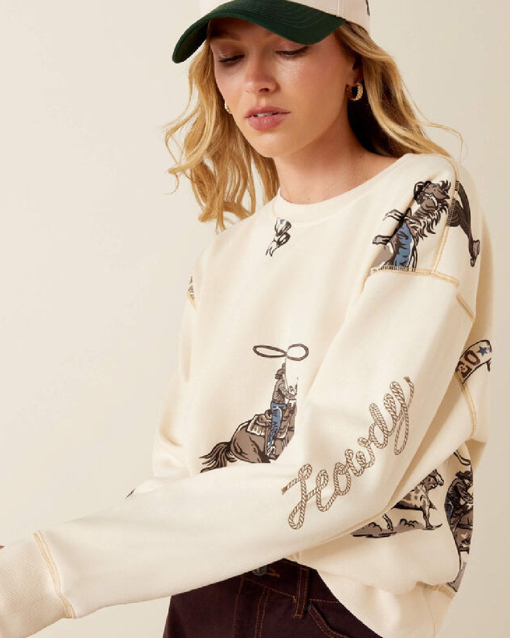 Yellow coloured Ariat Rancher Sweatshirt on beige background 