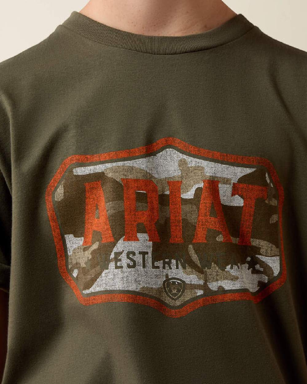 Green coloured Ariat Wild Creek Camo T-Shirt on beige background 