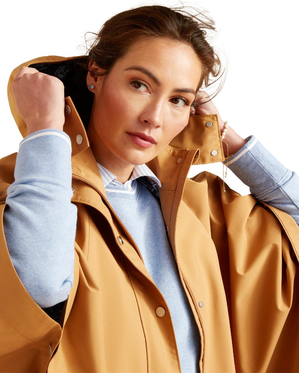 Travertine Coloured Ariat Womens Anza Waterproof Cape on white background 