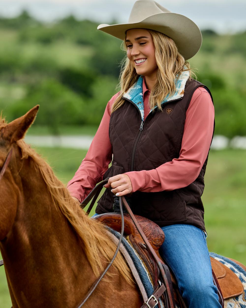 Mole Coloured Ariat Womens Dilon 2.0 Reversible Insulated Vest outdoor background 