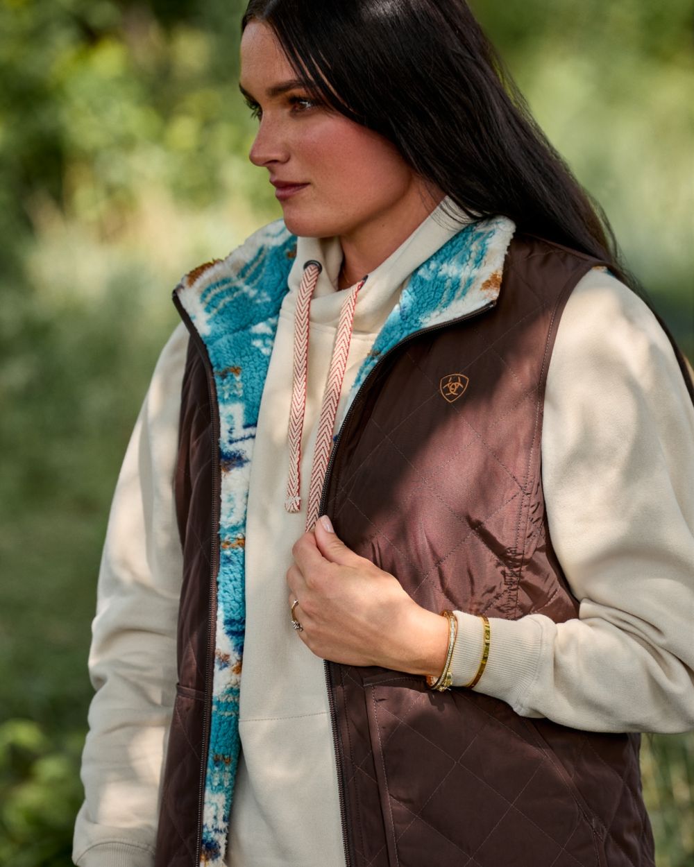 Mole Coloured Ariat Womens Dilon 2.0 Reversible Insulated Vest outdoor background 