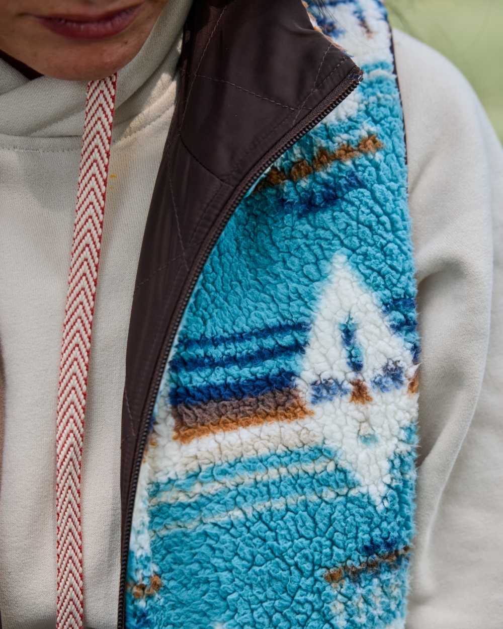 Mole Coloured Ariat Womens Dilon 2.0 Reversible Insulated Vest outdoor background 