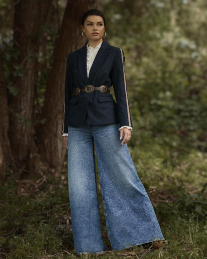 Navy coloured Ariat Womens Dornie Blazer on forest background 