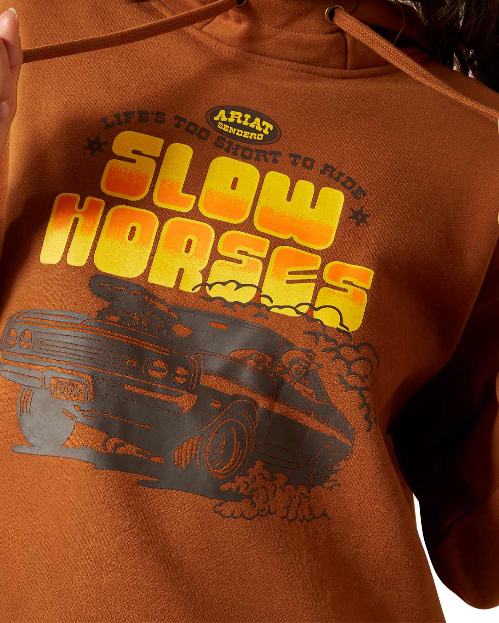 Glazed Ginger Coloured Ariat Womens Essential Sendero Slow Horses Hoodie on white background 