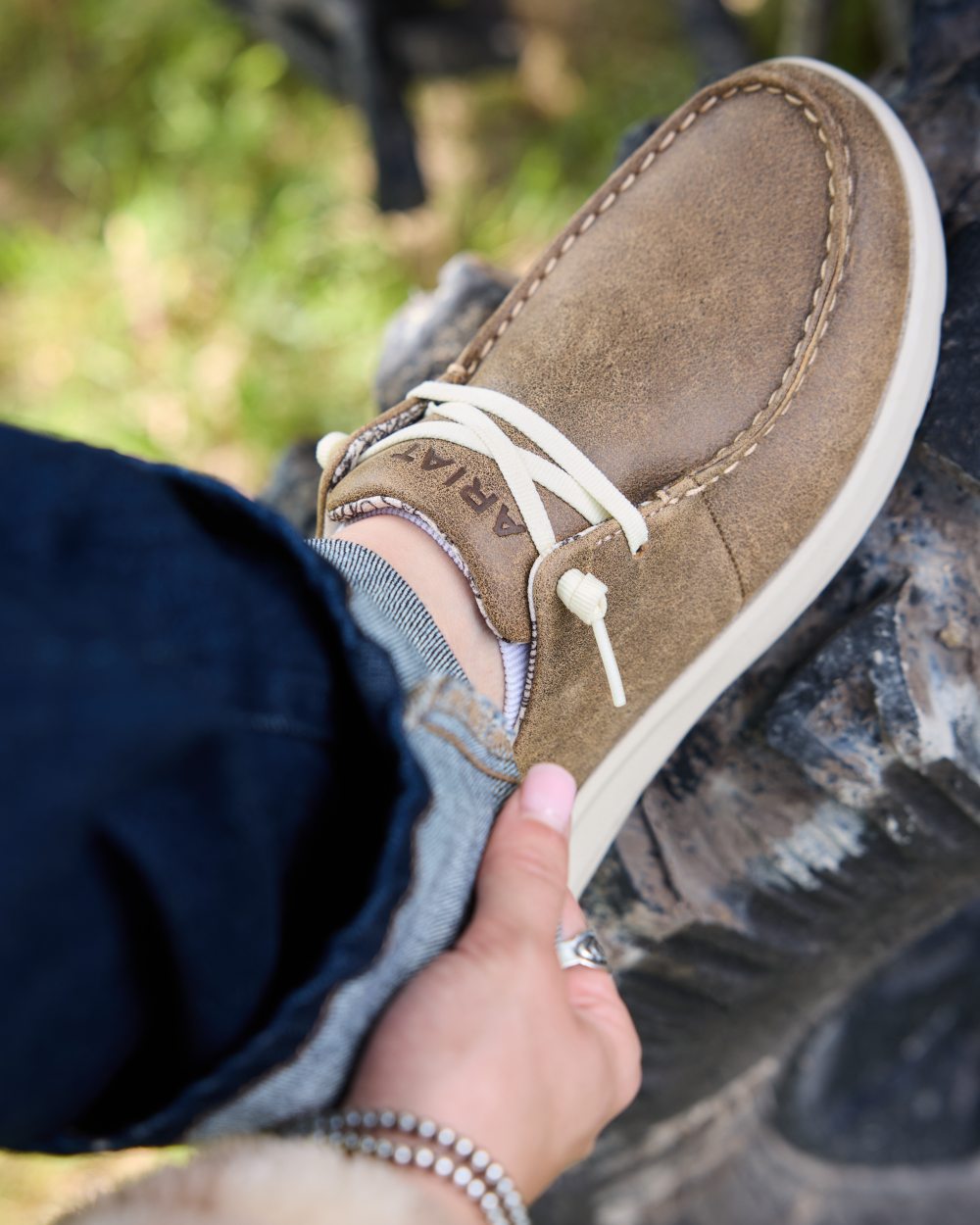 Brown Bomber coloured Ariat Womens Hilo Shoes on outdoor background 