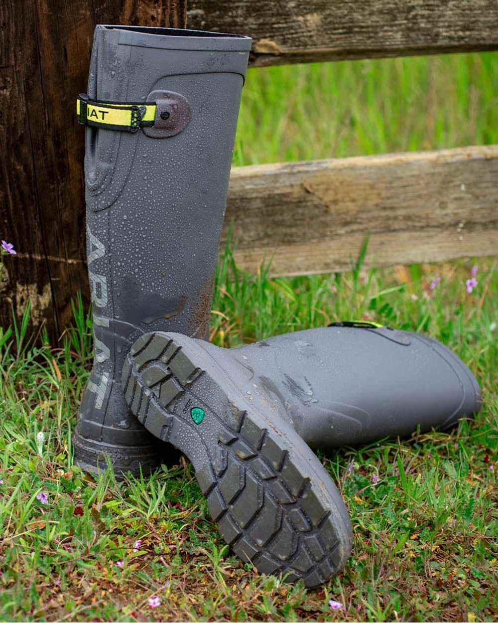 Grey coloured Ariat Womens Kelmarsh Wellington Boots on Grassy background 