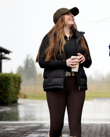 Black Coloured Ariat Womens Lucent Quarter Zip Baselayer on outdoor background 