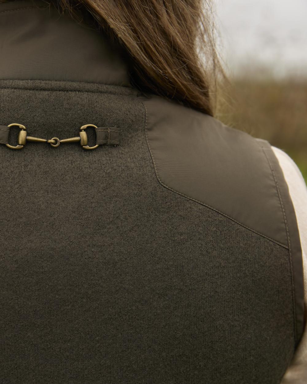 Earth coloured Ariat Womens Millbrae Gilet on field background 