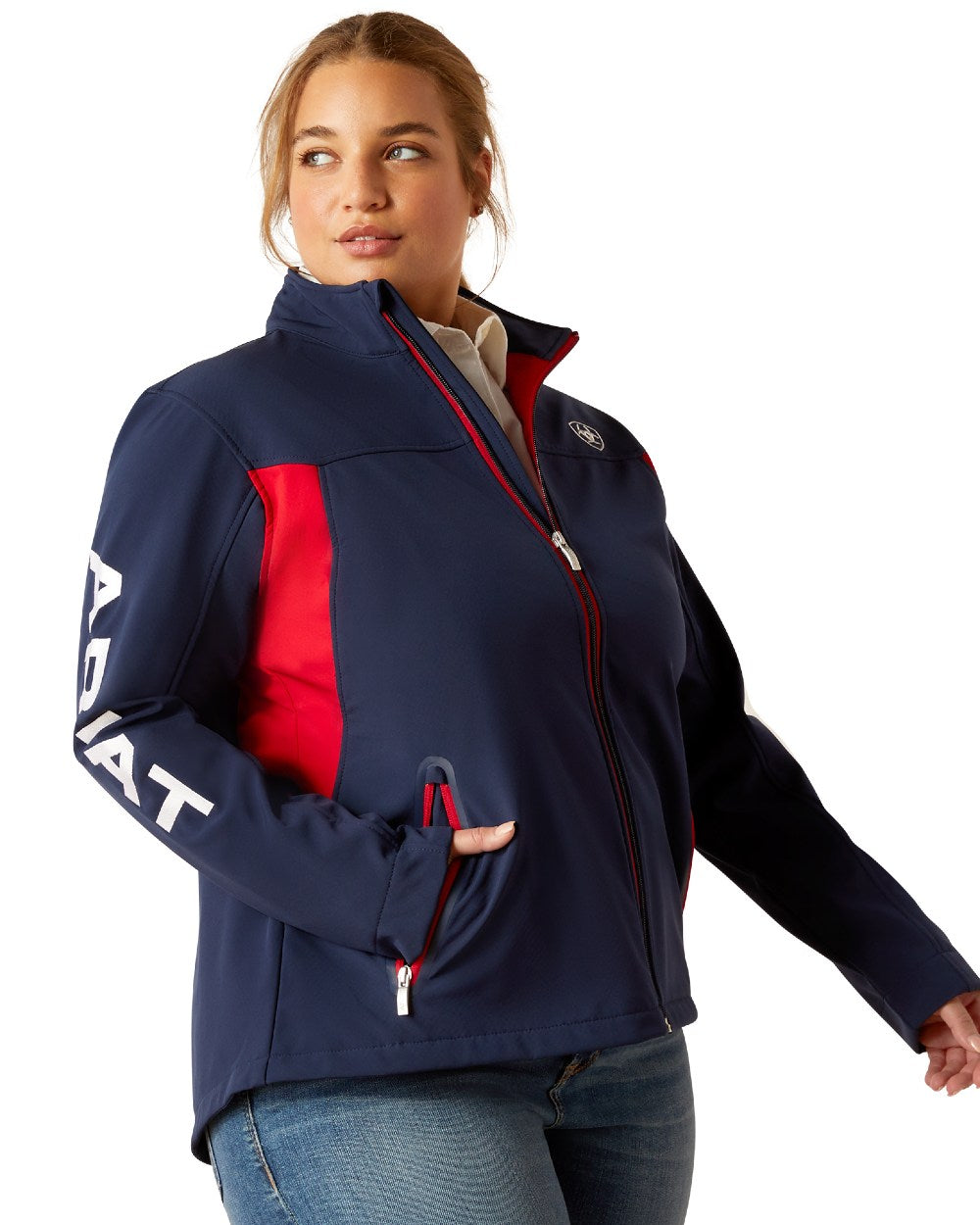 Navy Red coloured Ariat Womens New Team Softshell Jacket on white background 