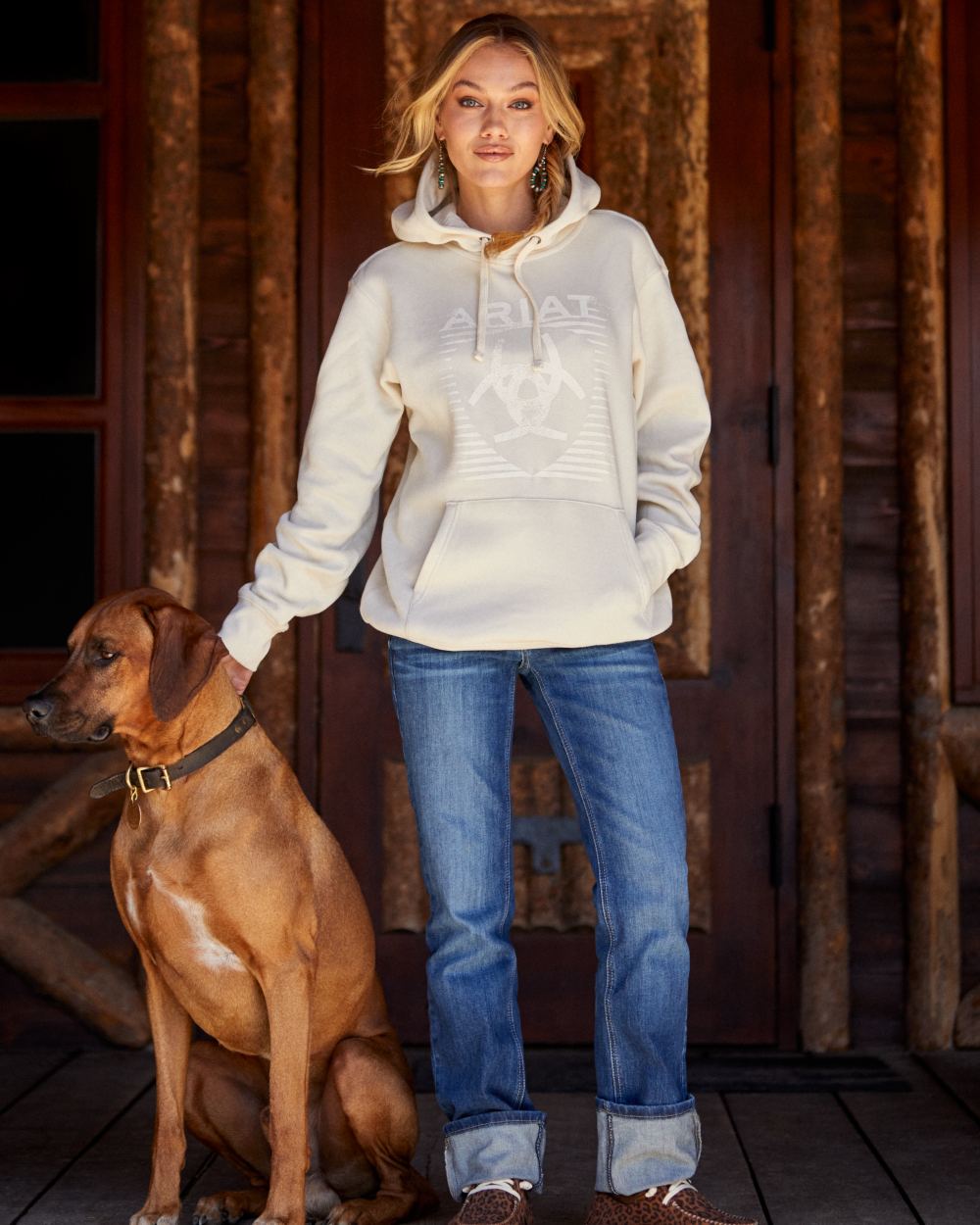 Mackenzie coloured Ariat Womens Real Perfect Rise Abby Straight Jeans on outdoor background 