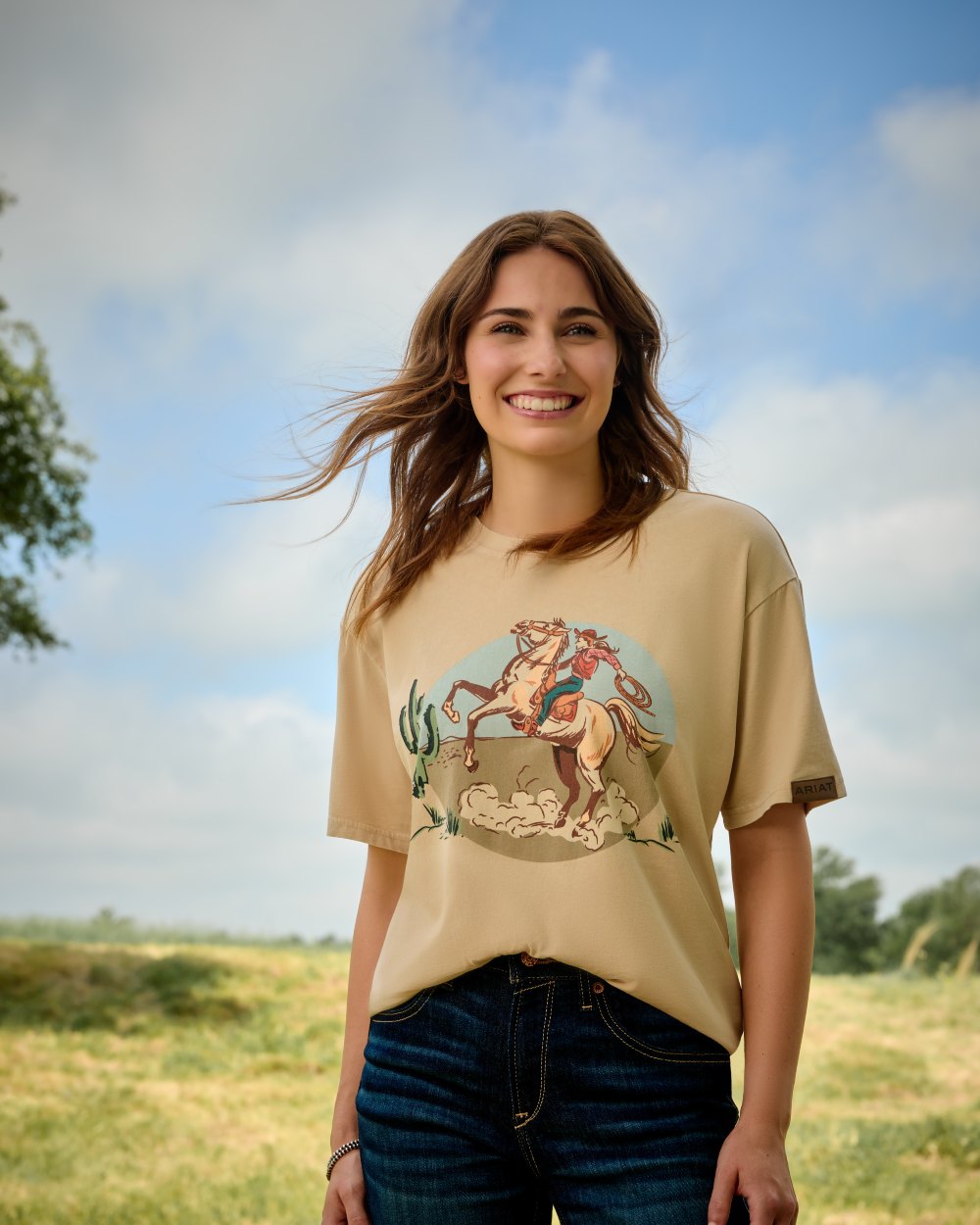 Oyster Grey Coloured Ariat Womens Ride On T-Shirt on outdoor background 