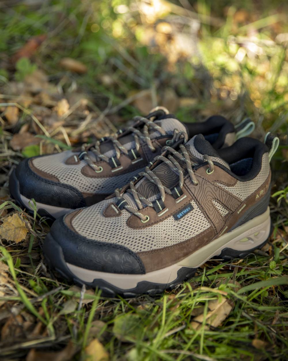 Brown Bark coloured Ariat Womens Traverse Low Waterproof Hiking Shoes on grassy background 
