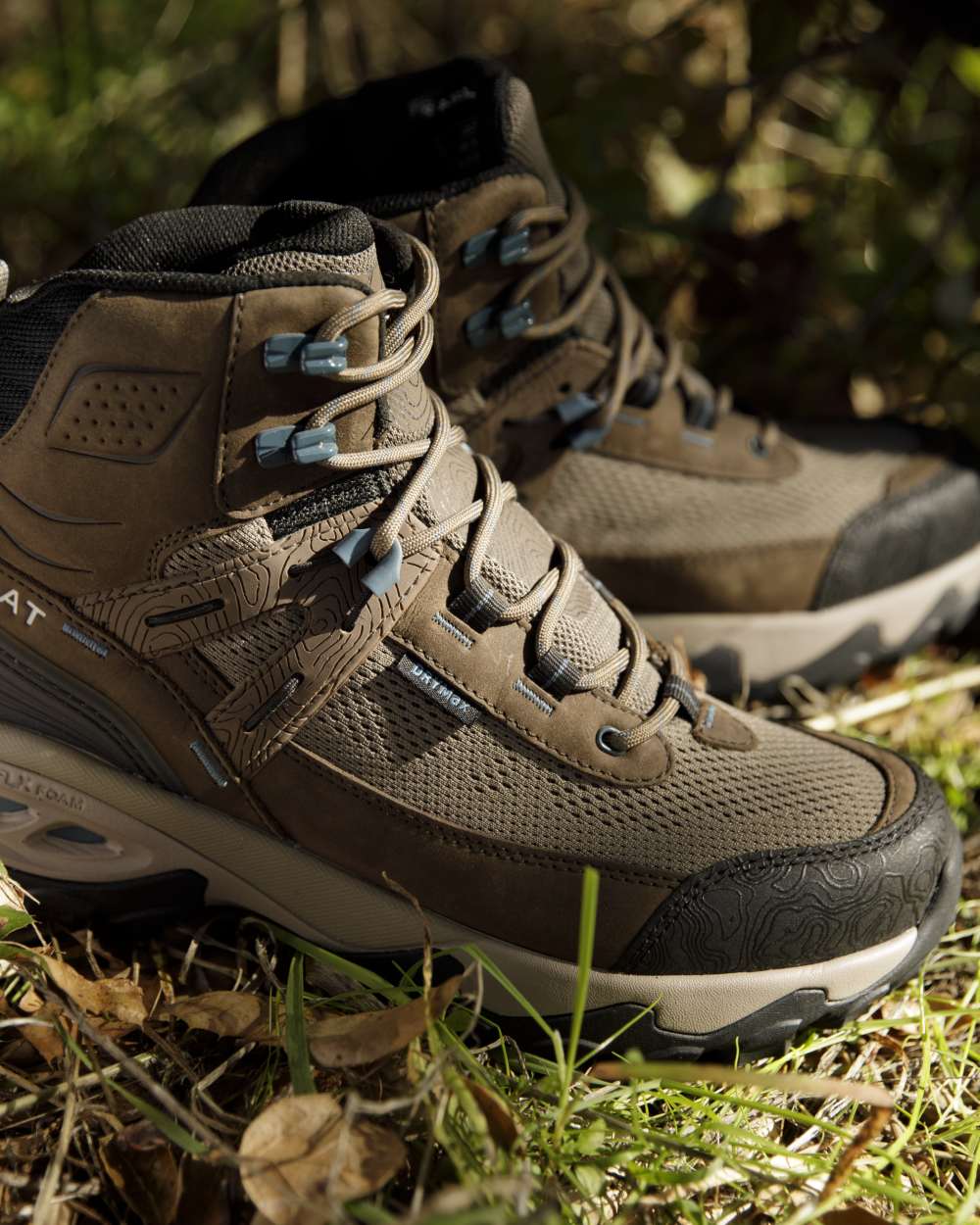 Brown Bark coloured Ariat Womens Traverse Mid Waterproof Hiking Boots on grassy background 