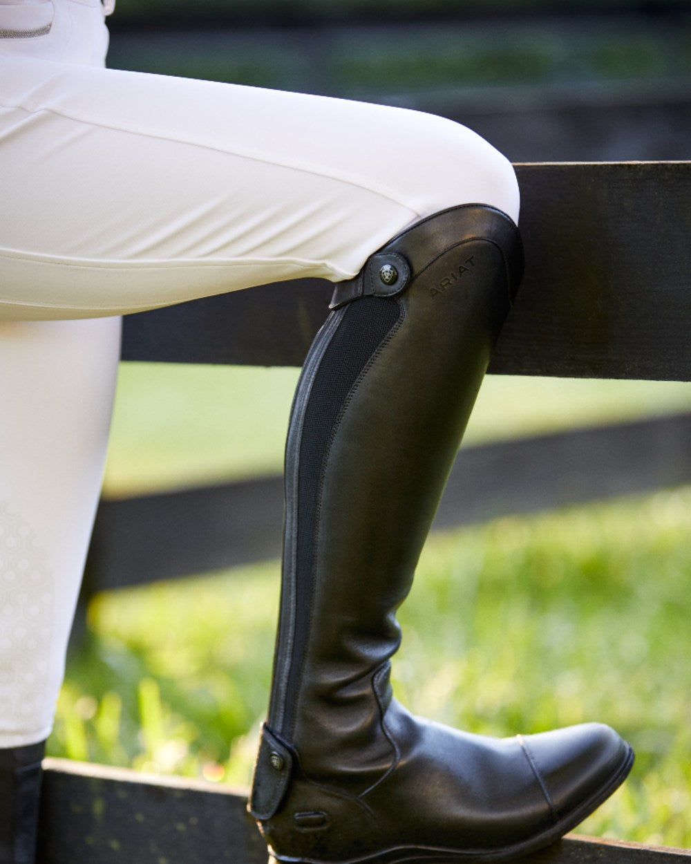 White coloured Ariat Womens Tri Factor Grace Knee Patch Breeches on grass background 