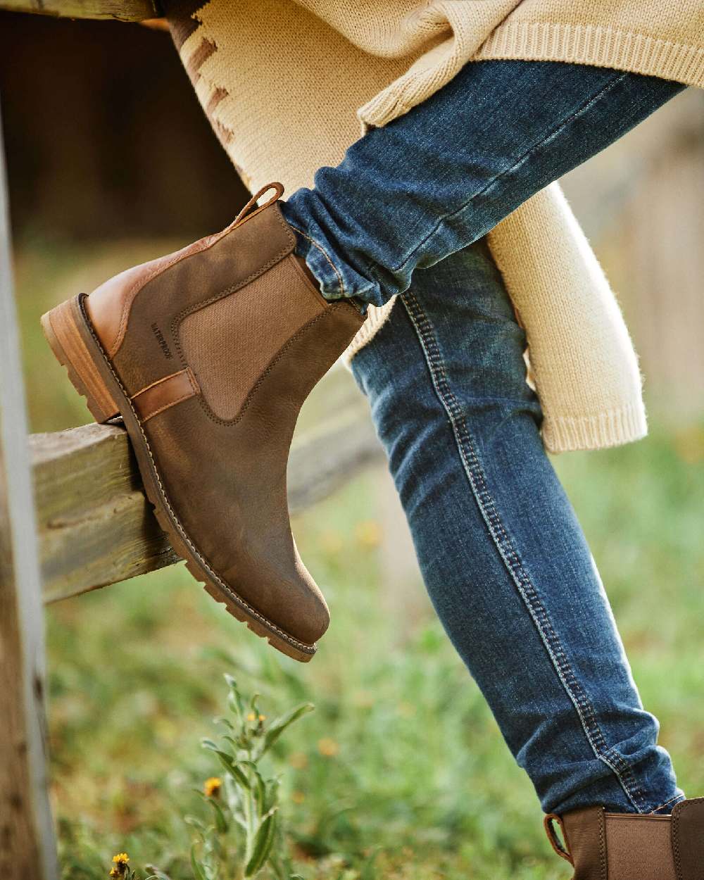 Java coloured Ariat Womens Wexford Waterproof Boots on grass background 