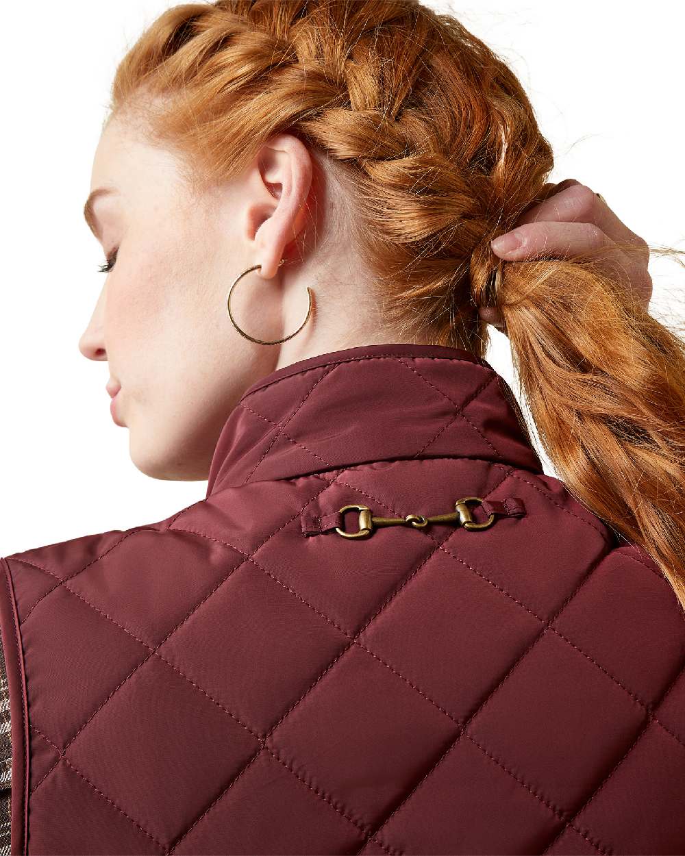 Tawny Port Coloured Ariat Womens Woodside Quilted Gilet on white background 