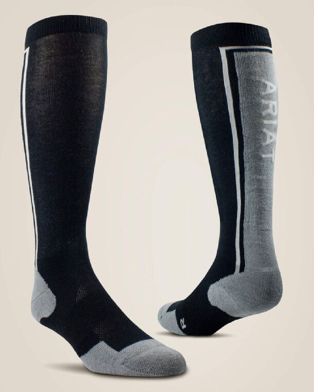 Black colored AriatTEK Winter Slimline Sock on beige background 