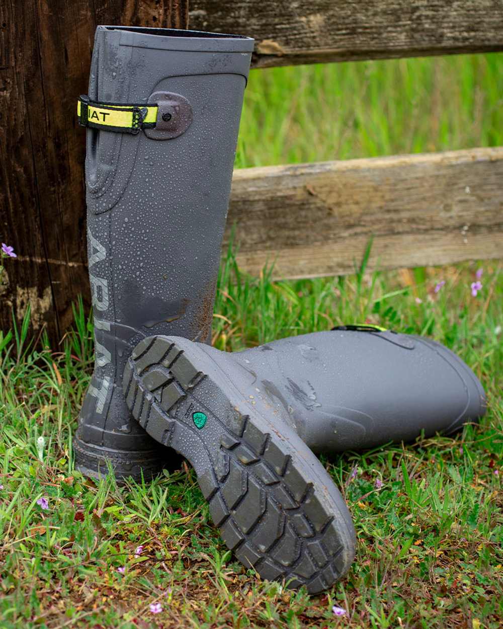 Grey coloured Ariat Womens Kelmarsh Wellington Boots on Grassy background 