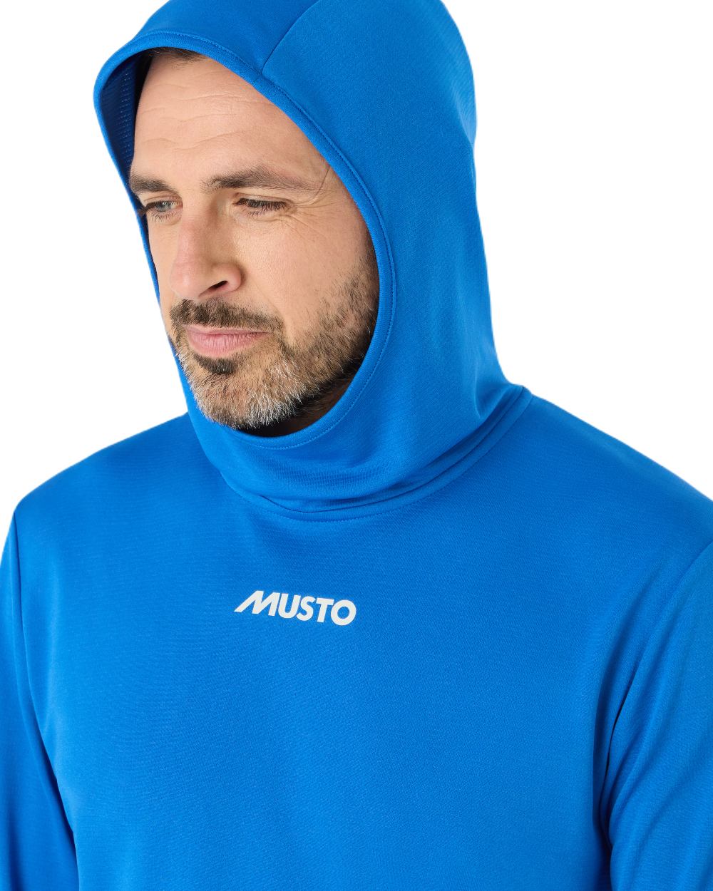 Aruba Blue Coloured Musto Mens Evolution Sunblock Fast Dry Hoodie On A White Background 