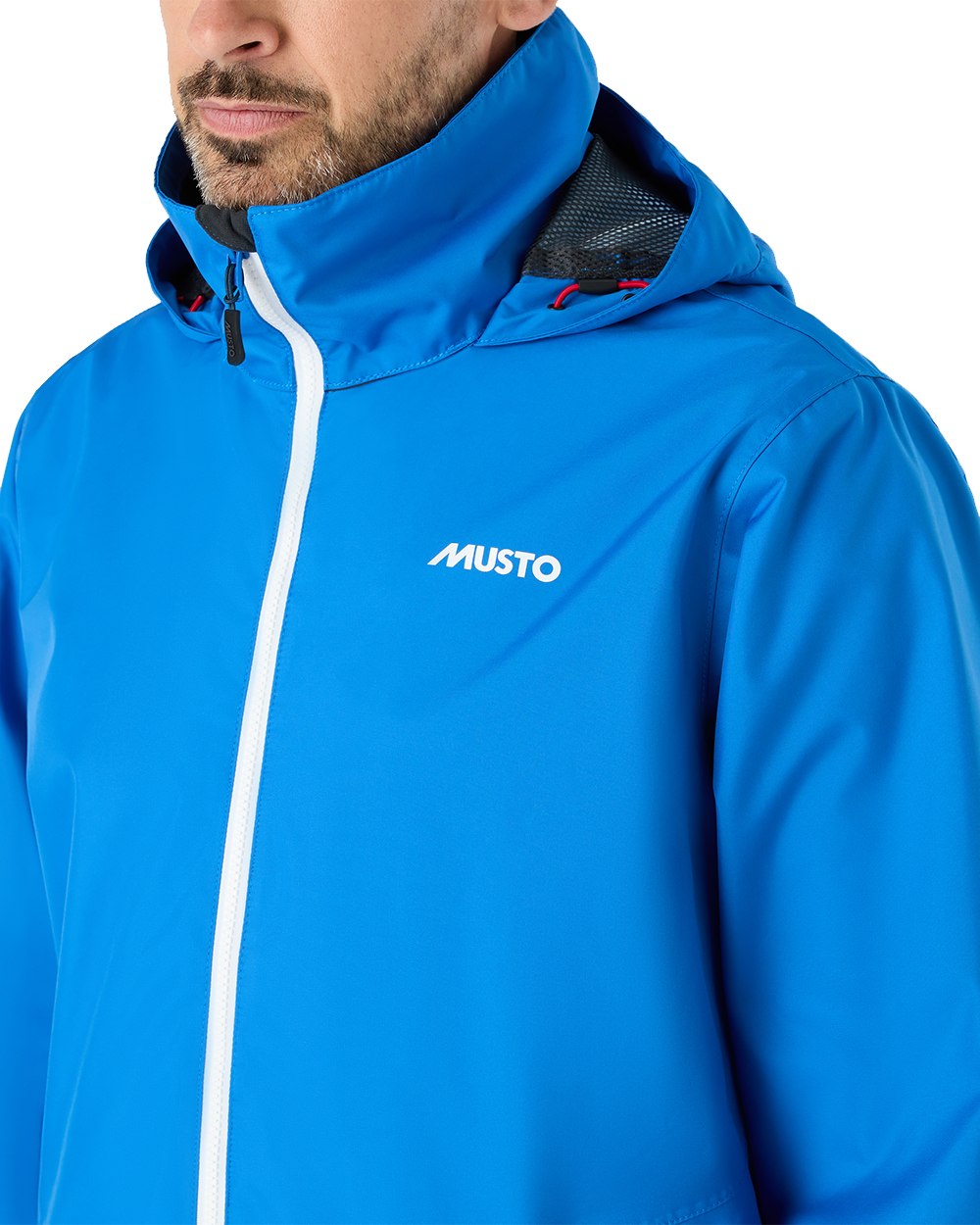 Aruba Blue Coloured Musto Mens Nautic Rain Jacket On A White Background 