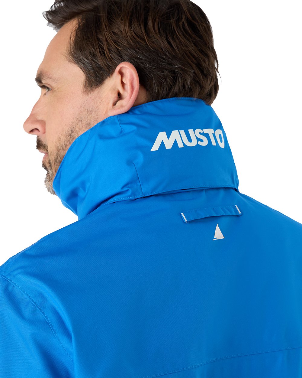 Aruba Blue Coloured Musto Mens Nautic Rain Jacket On A White Background 