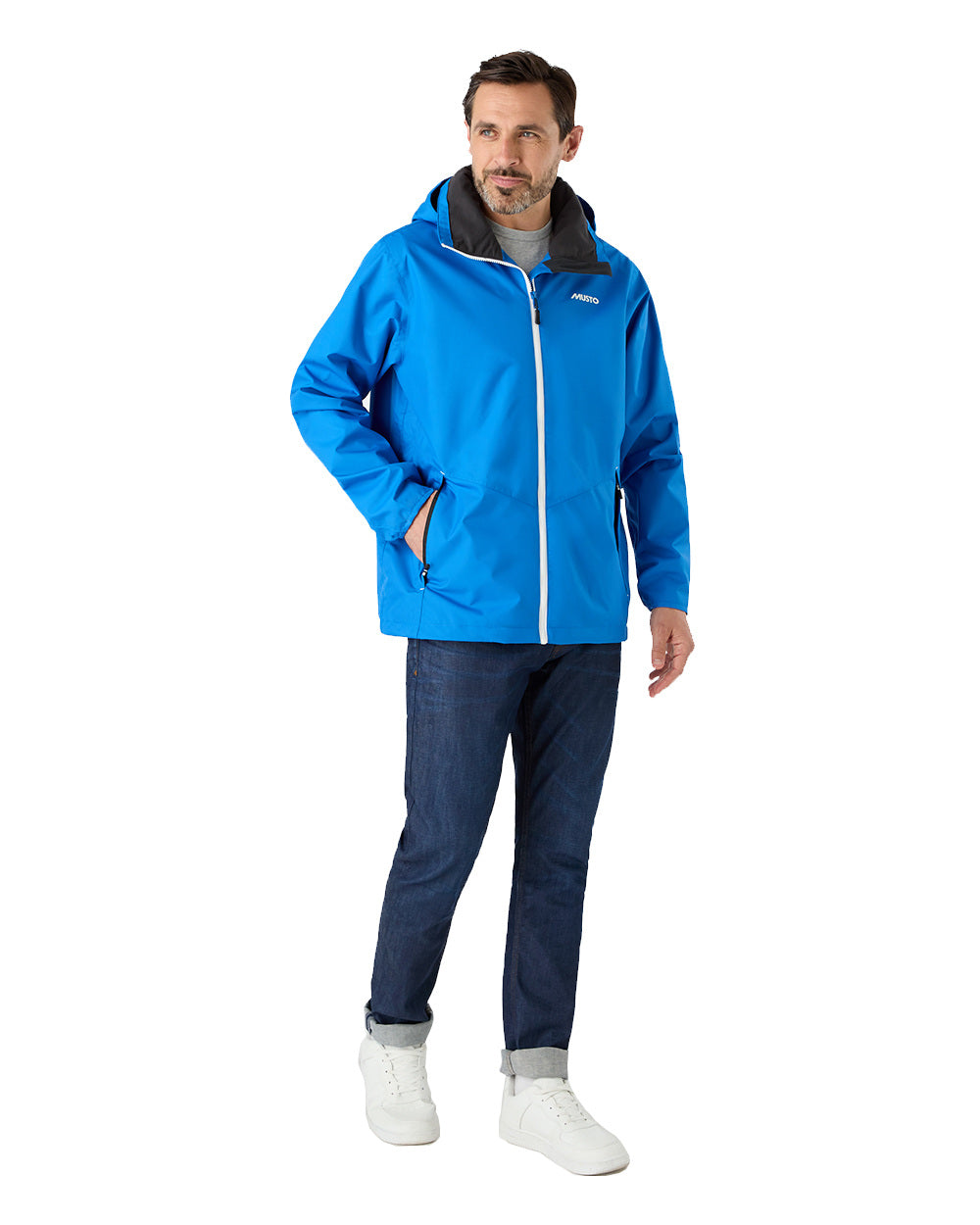 Aruba Blue Coloured Musto Mens Nautic Rain Jacket On A White Background 