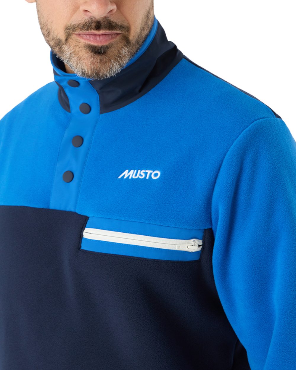 Aruba Blue/Navy Coloured Musto 64 Fleece Pullover On A White Background 