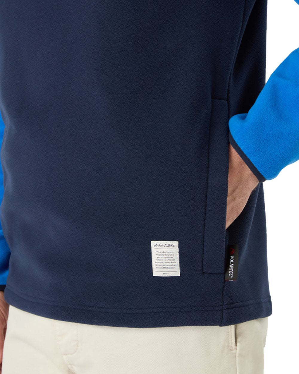 Aruba Blue/Navy Coloured Musto 64 Fleece Pullover On A White Background 