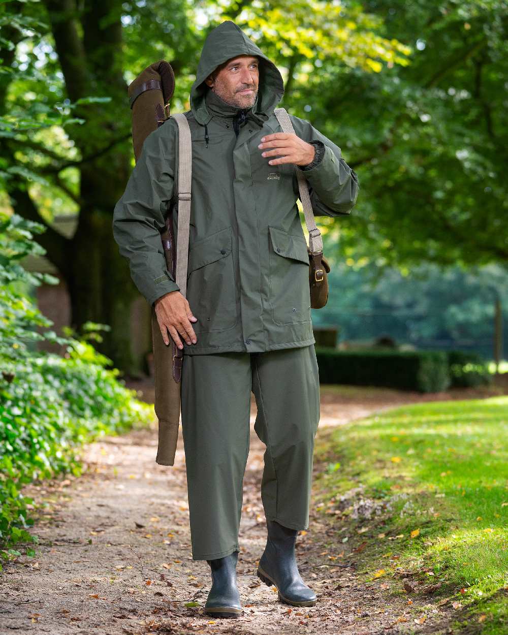 Khaki Coloured Baleno Arras Rain Jacket on forest background 