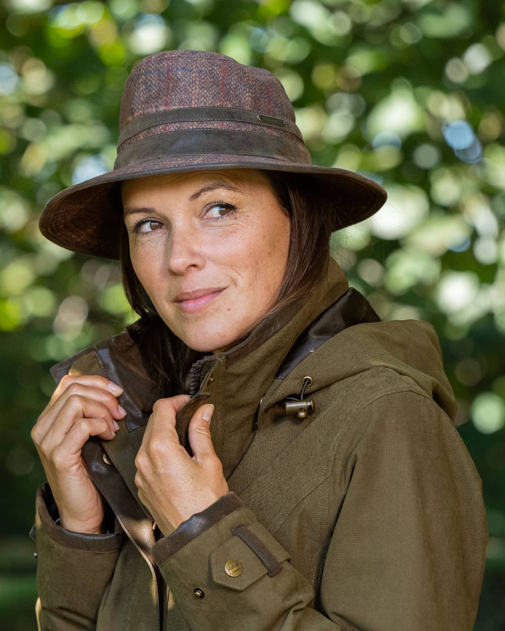 Check Brown Coloured Baleno Caitlin Printed Tweed Hat on blurry background 