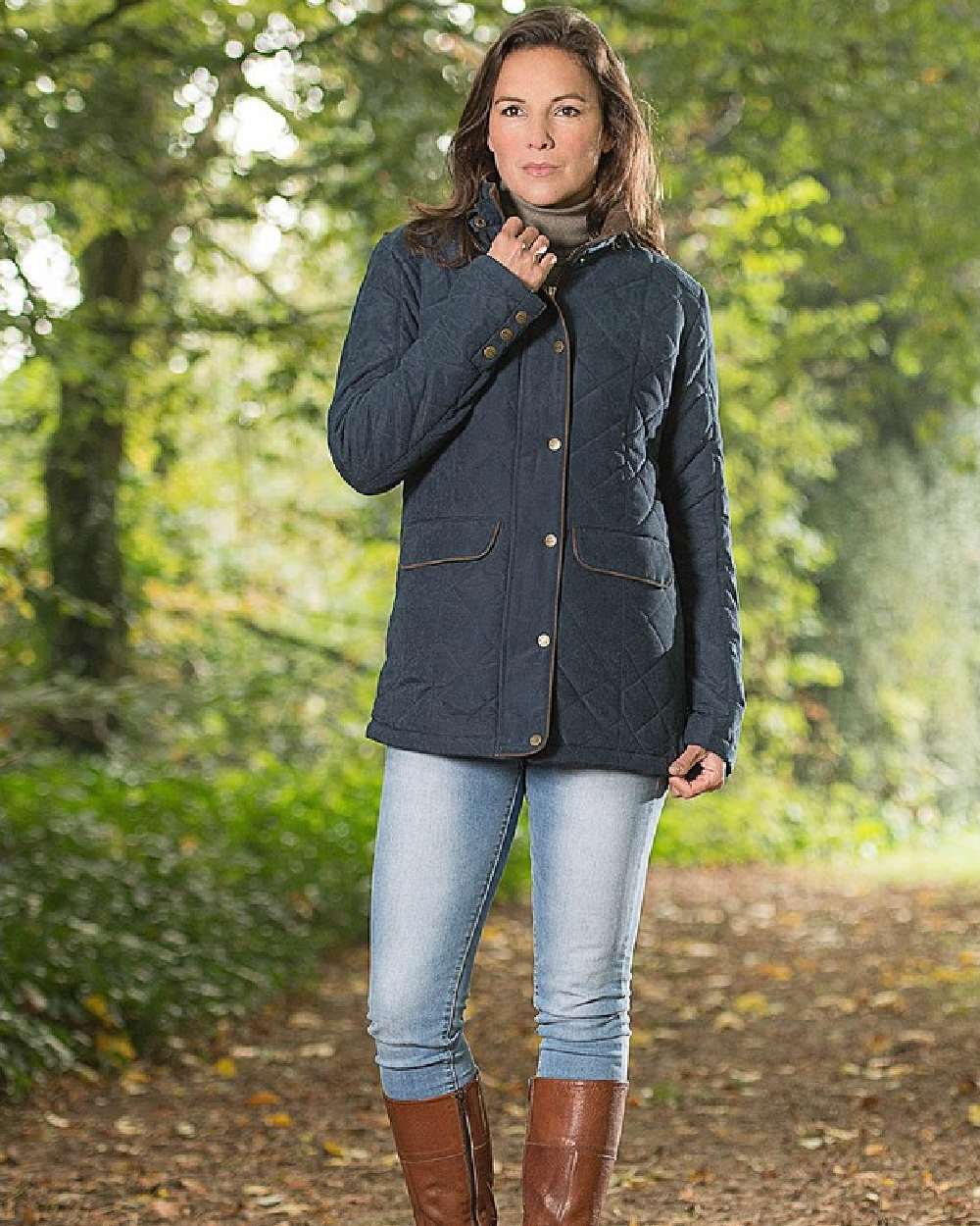 Navy Blue Coloured Baleno Cheltenham Quilted Jacket on forest background 