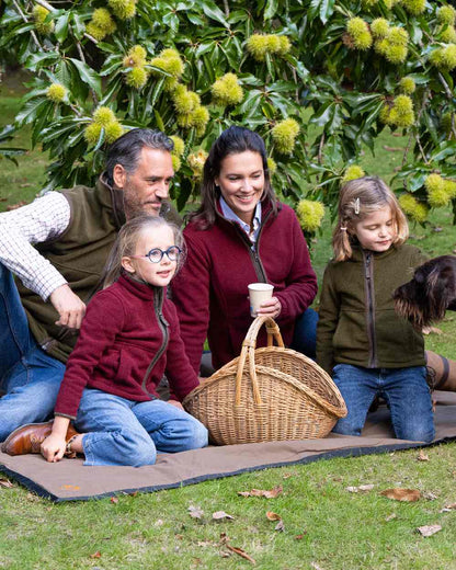 Burgundy Coloured Baleno Kids Cody Fleece on park background 