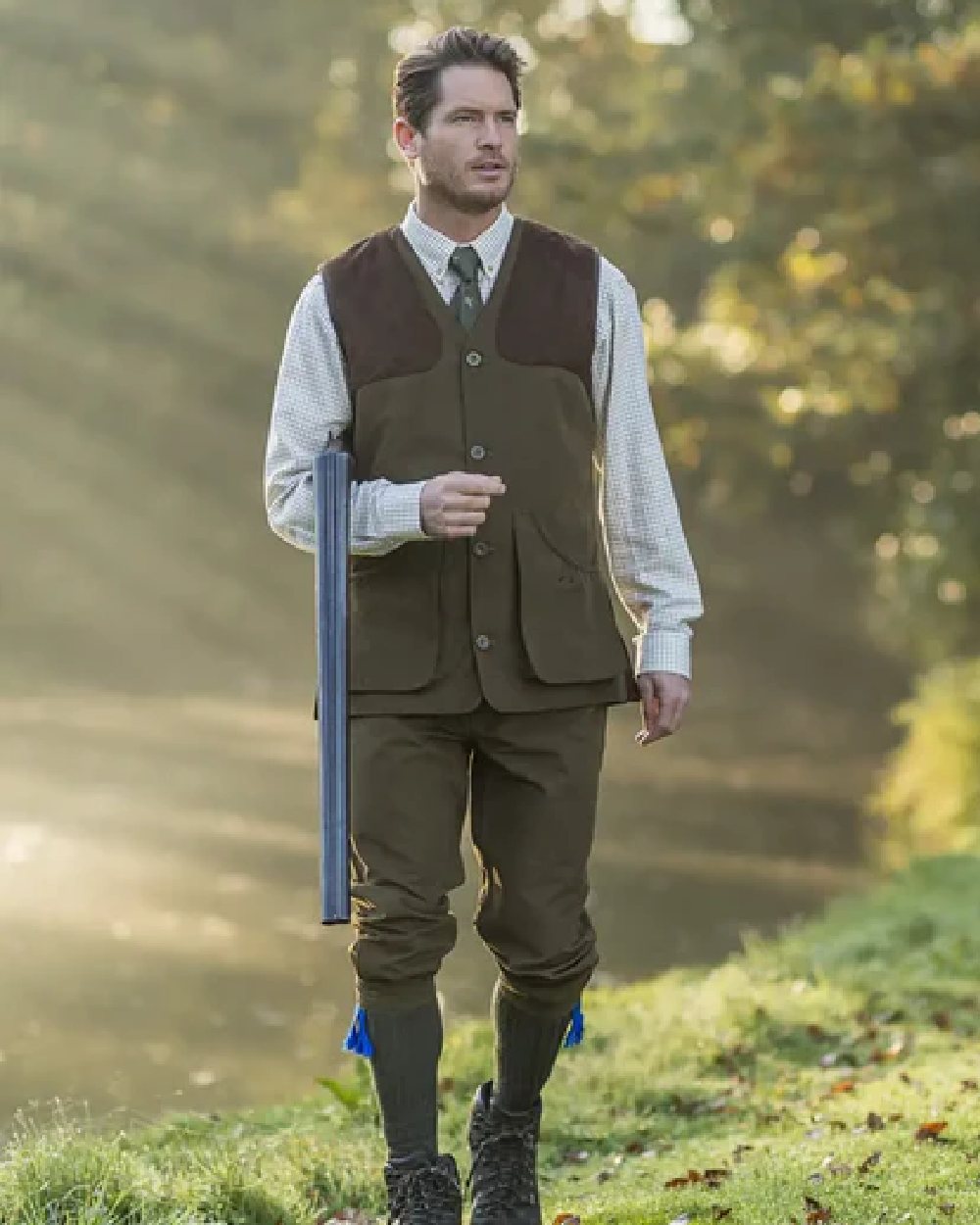 Pine Green Coloured Baleno Dolman Gilet on lake background 