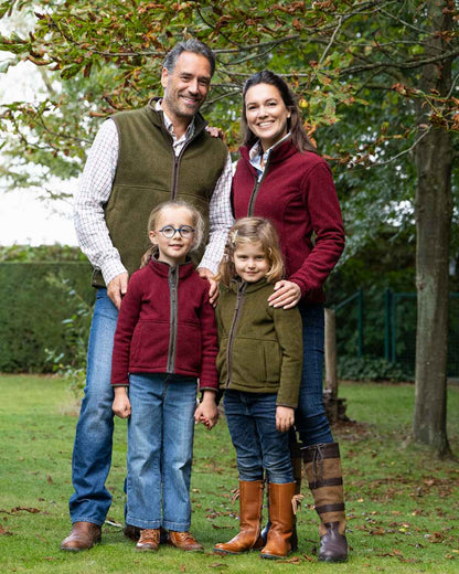 Olive Coloured Baleno Harvey Fleece Gilet on garden background 