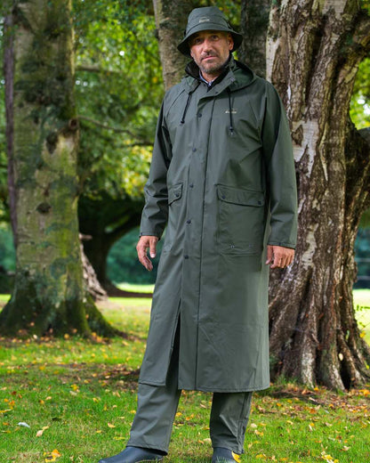 Green Khaki Coloured Baleno Helsinki Long Raincoat on nature background 