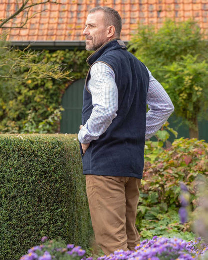 Navy Blue Coloured Baleno Holt Mens Fleece Gilet on garden background 