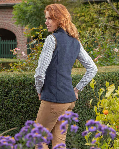 Navy Blue Coloured Baleno Ladies Surrey Fleece Gilet on garden background 