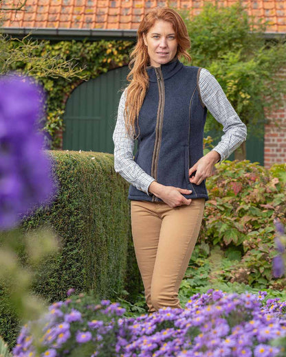 Navy Blue Coloured Baleno Ladies Surrey Fleece Gilet on garden background 