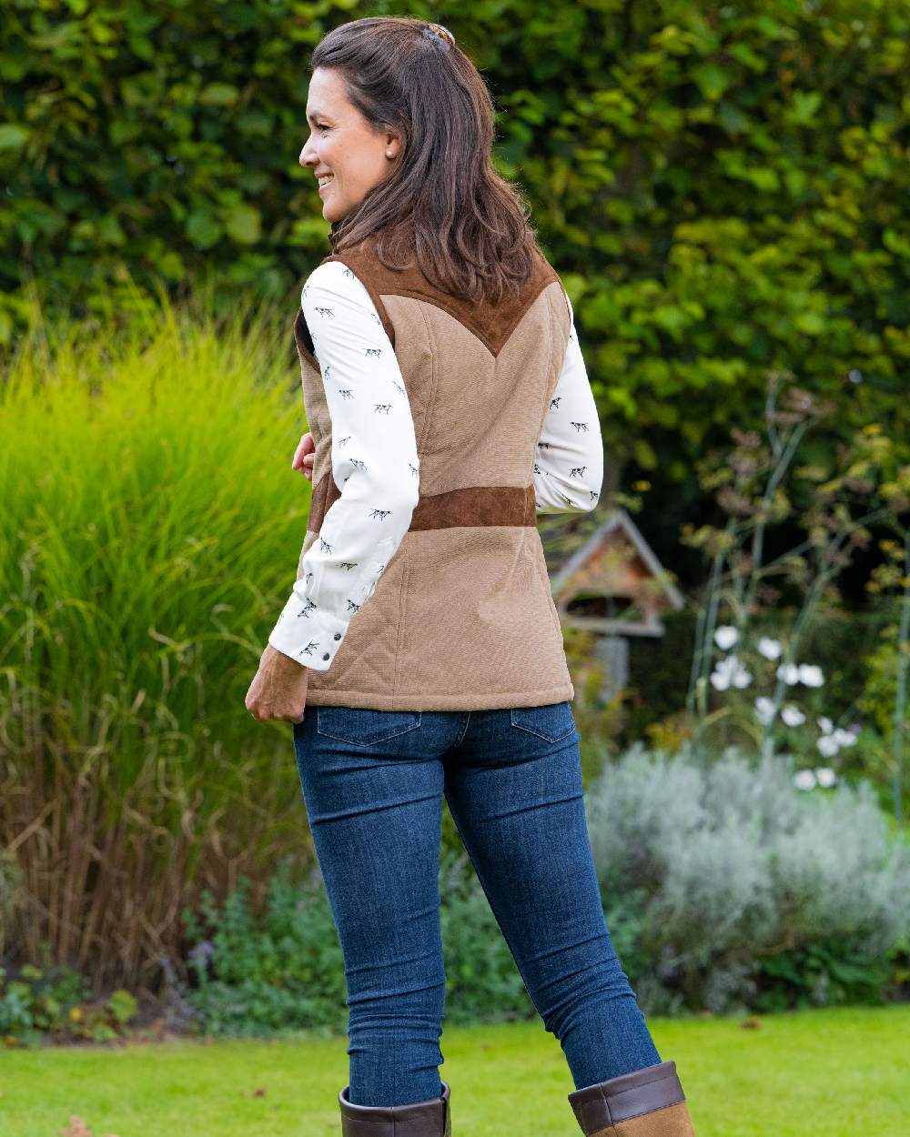 Camel Coloured Baleno Maree Dobby Quilted Ladies Bodywarmer on countryside background 