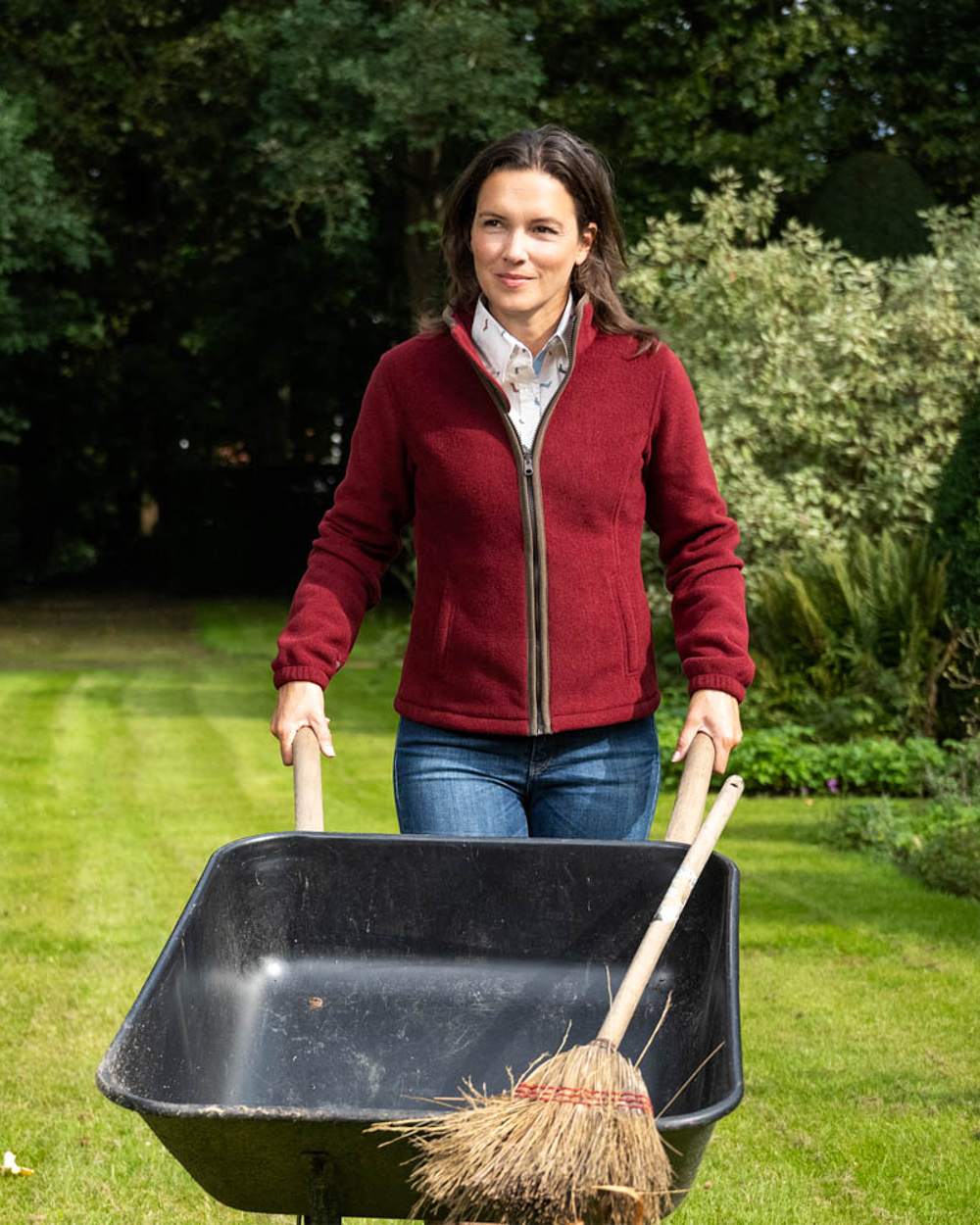 Burgundy Coloured Baleno Sarah Fleece Jacket on garden background 