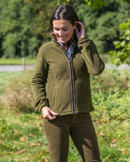 Olive Coloured Baleno Sarah Fleece Jacket on forest background 