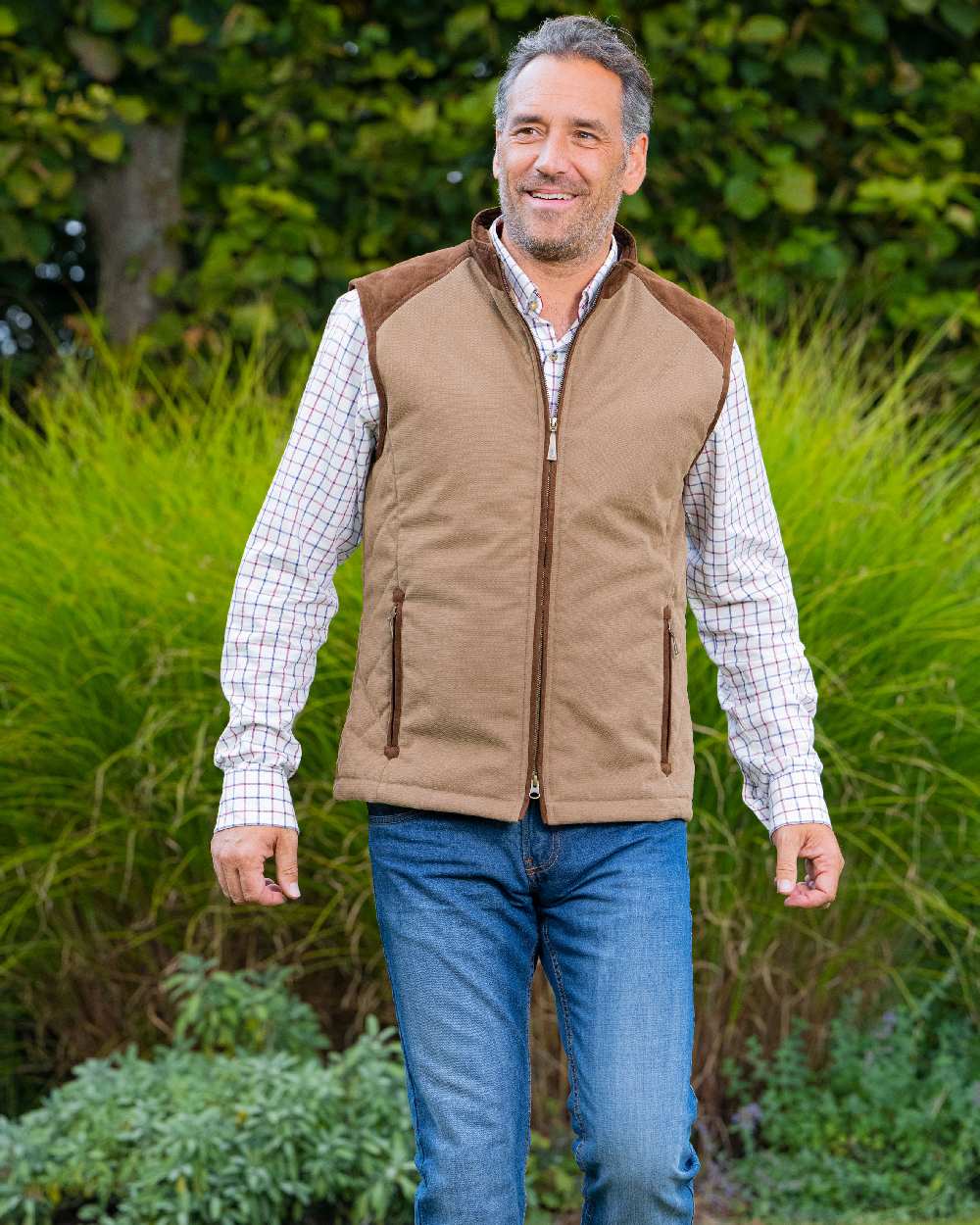 Camel Coloured Baleno Scott Quilted Mens Bodywarmer on countryside background 