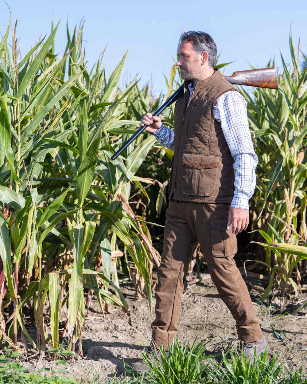 Earth Brown Coloured Baleno Thames Quilted Bodywarmer on farm background 