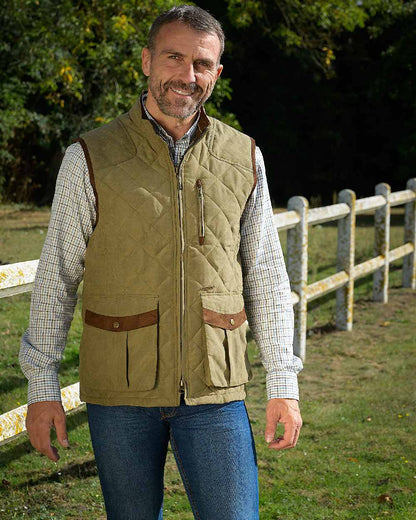 Light Khaki Coloured Baleno Thames Quilted Bodywarmer on forest background 