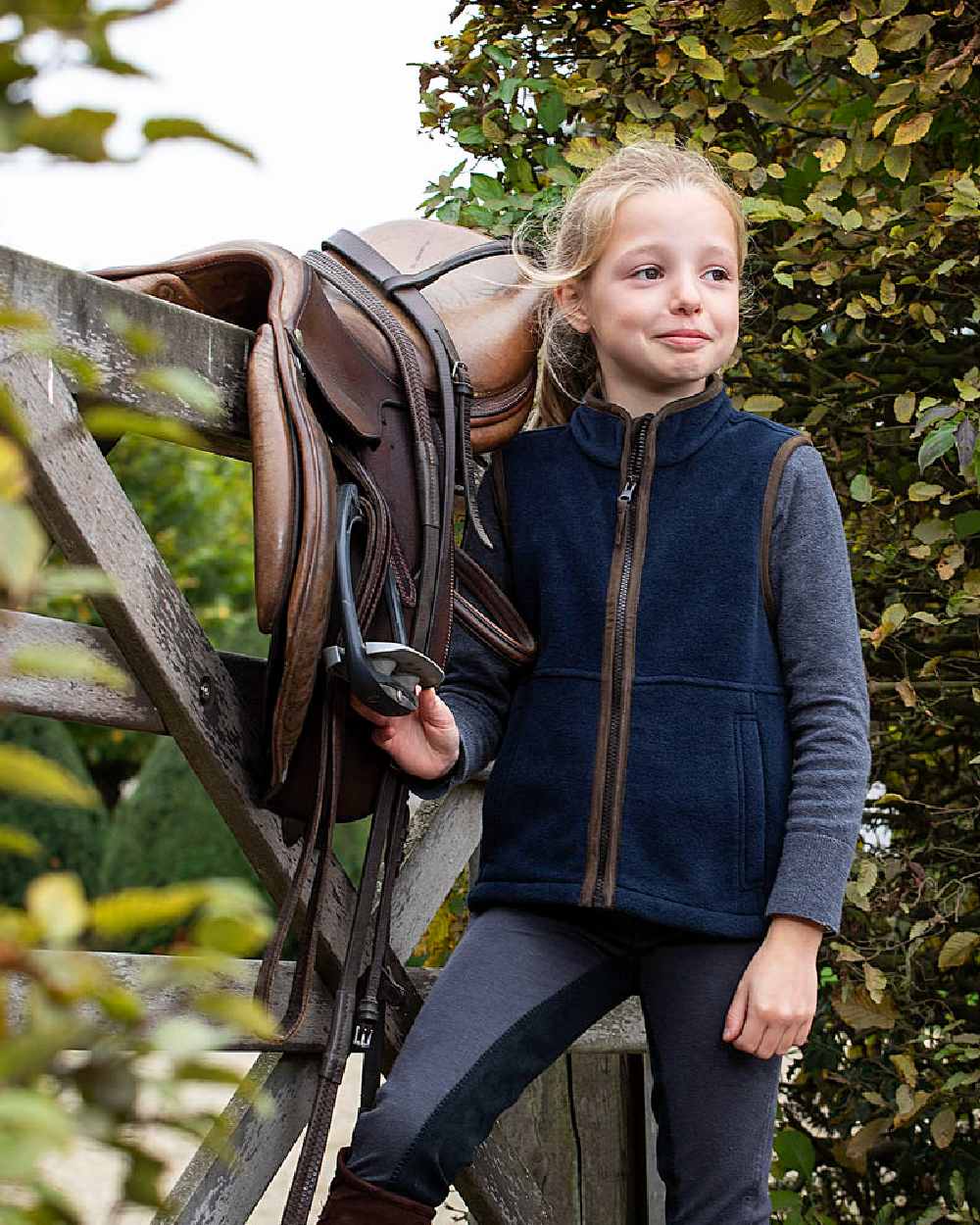 Navy Blue Coloured Baleno Wizz Kids Fleece Gilet on stable background 