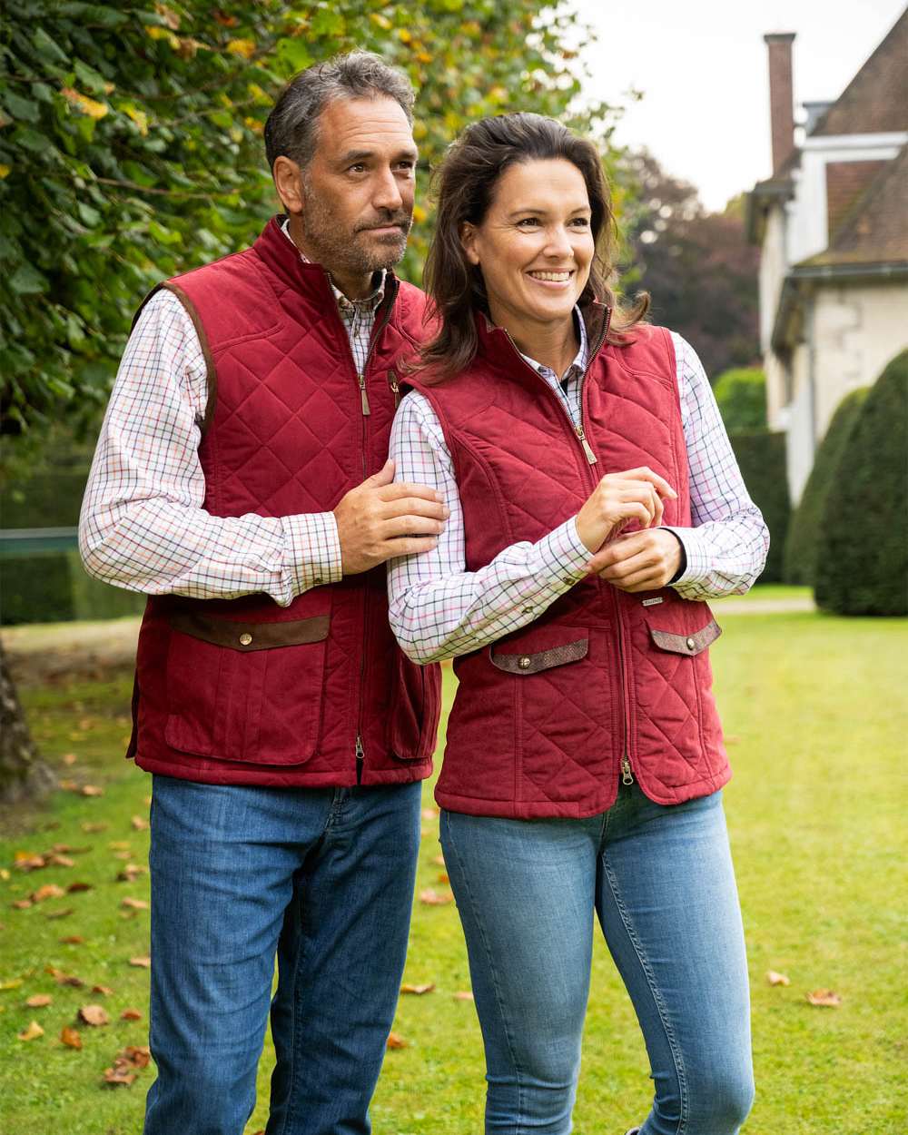 Burgundy Coloured Baleno Womens Chester Quilted Bodywarmer on house background 