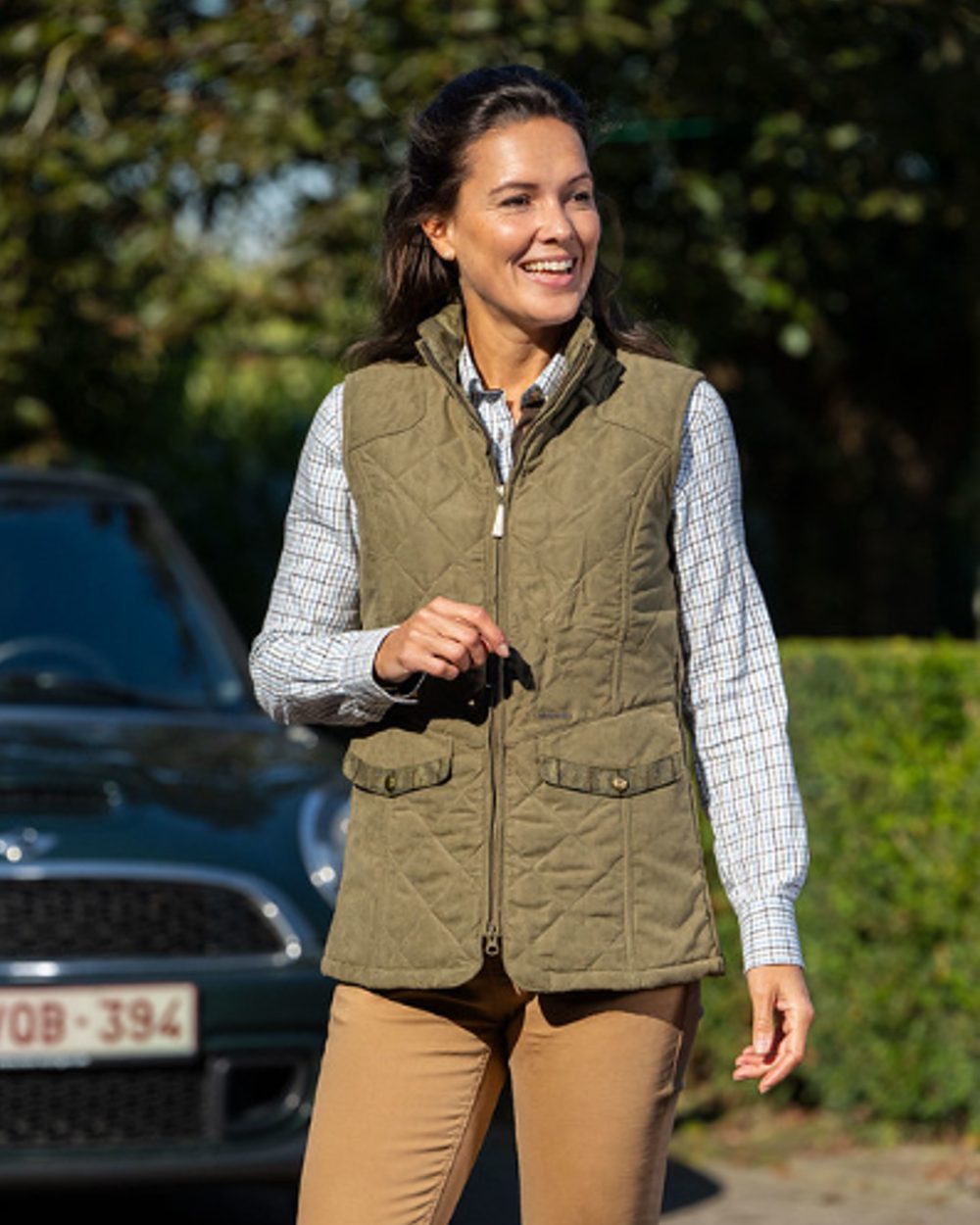 Light Khaki Coloured Baleno Womens Chester Quilted Bodywarmer on car background  